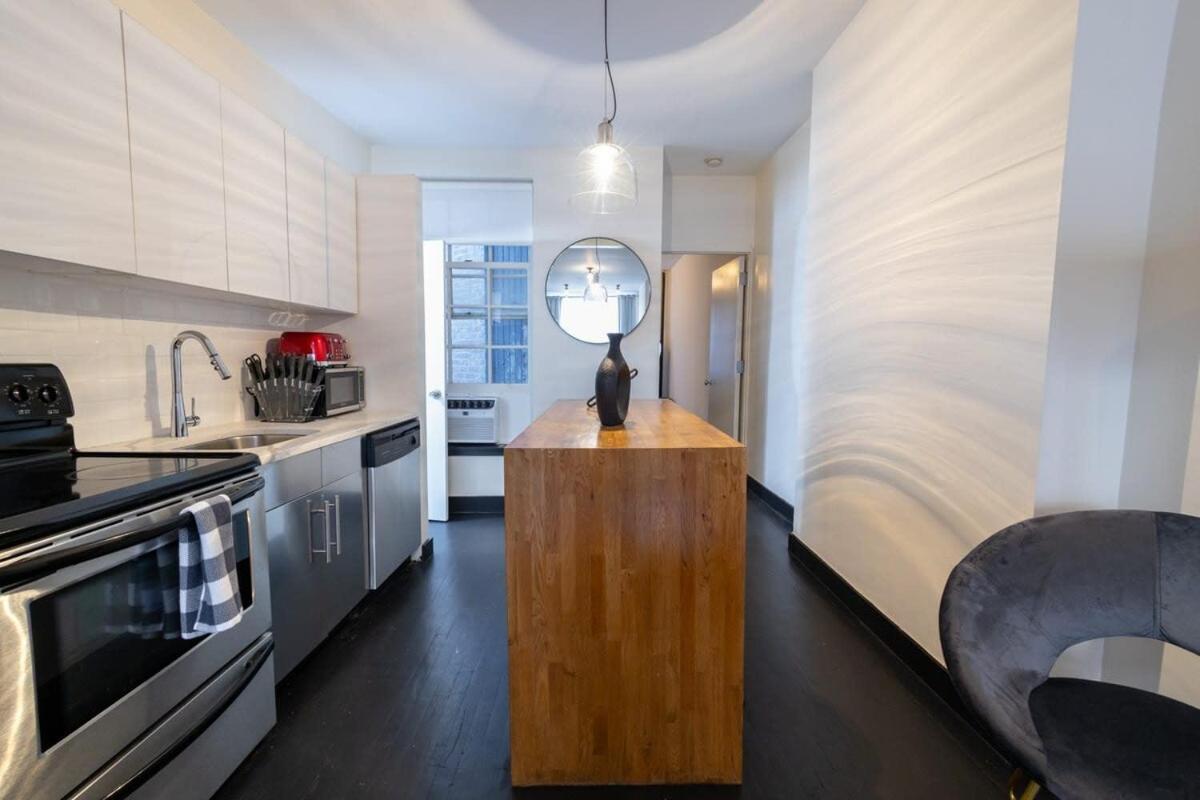 E10-1 Designer East Village Townhouse 1br Apartamento *