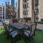 Sophisticated 4 Bedroom Duplex With Private Rooftop